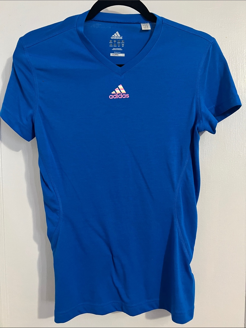 adidas women’s Blue V-Neck Athletic Polo with Pink Logo